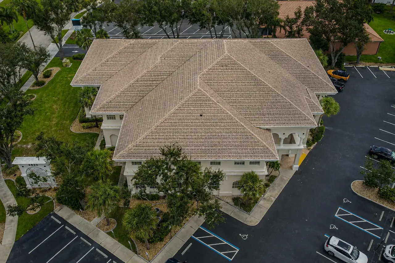 The office suite with its worn, end-of-life roof